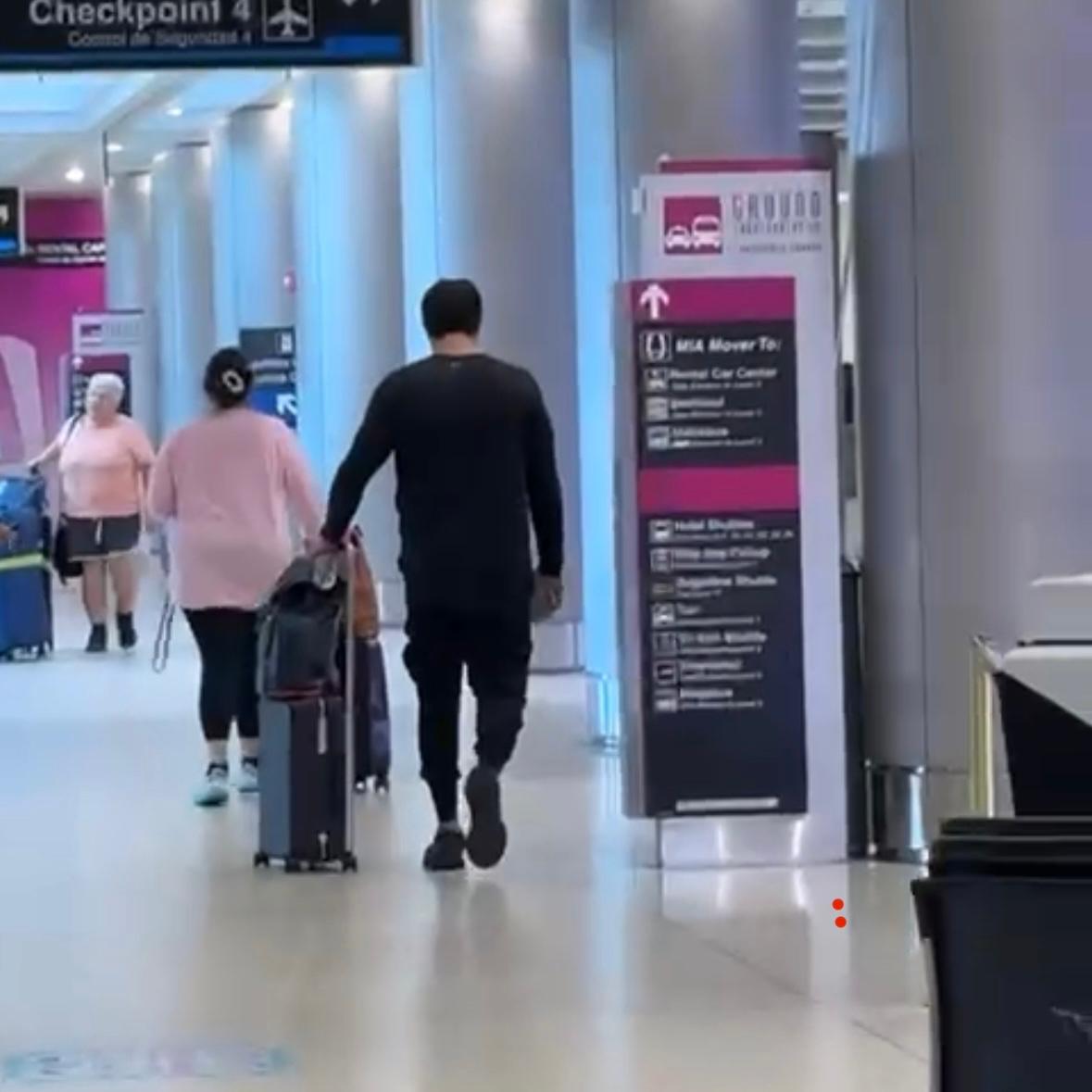 Redacted surveillance photo from a real airport-arrival surveillance case